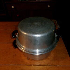 Vtg Wearever cast aluminum dutch over 10 in logo handles steam rack unique 814